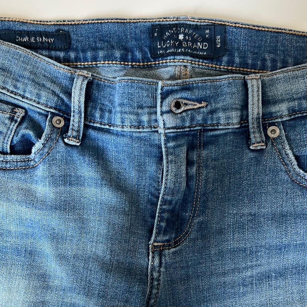 Lucky brand .Charlie skinny size 6/28 lightly worn medium light wash.